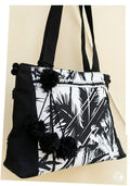 Handcrafted Black & Off-White Khaddar Tote Bag with Tropical Print and Pom-Pom Accents