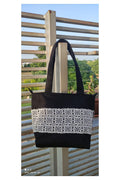 Elegant Black Canvas Tote Bag with Intricate Lace Detailing